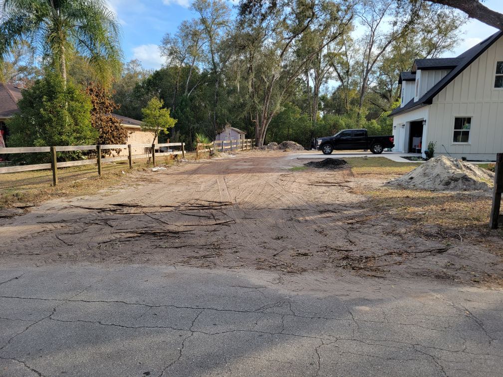 Driveway area before grading and millings installation in Deltona, FL